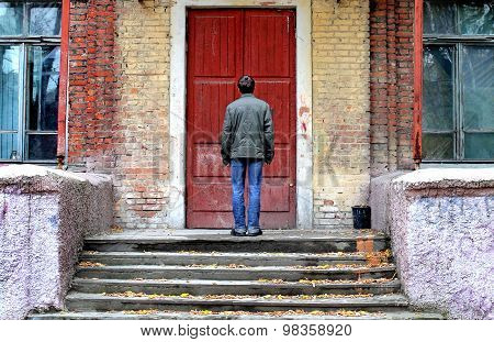 Man In Front Of The House