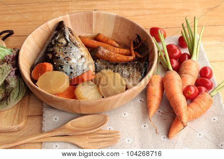 Salmon Head Cooked Of Tari Yaki Sauce With Fresh Vegetables.