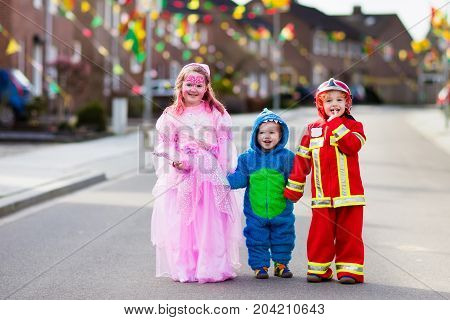 Kids On Halloween Trick Or Treat.