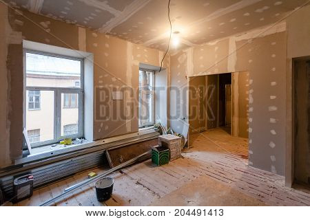 Material for repairs in an apartment is under construction remodeling rebuilding and renovation. Making walls from gypsum plasterboard or drywall.