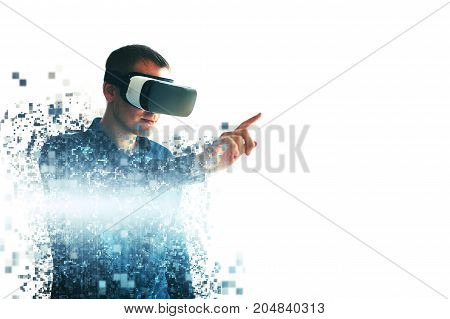 The man with glasses of virtual reality. Future technology concept. Modern imaging technology. Fragmented by pixels.