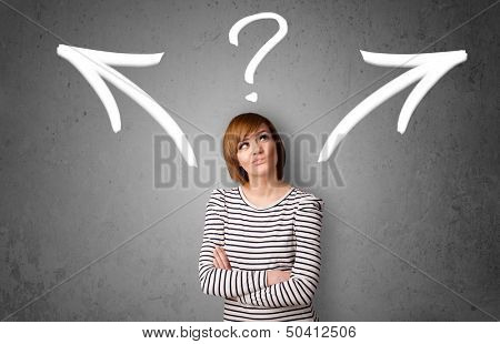 Pretty young woman making a decision with arrows and question mark above her head