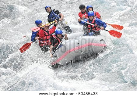 Rafting, splashing the white water