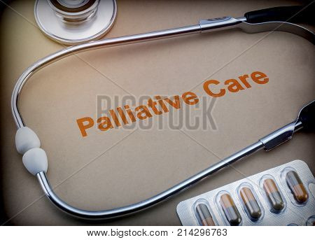 Palliative care, stethoscope and blister pills, conceptual image