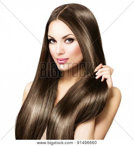 Beauty Model girl with Healthy Brown Hair. Beautiful brunette woman touching her long smooth shiny straight hair. Hairstyle. Hair cosmetics, haircare. Hair care, extensions. Isolated on white