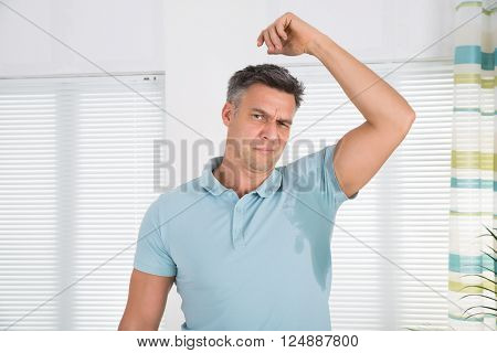 Man Sweating Very Badly Under Armpit