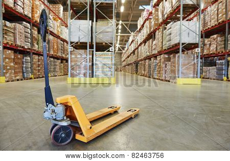 Manual forklift pallet stacker truck equipment at warehouse