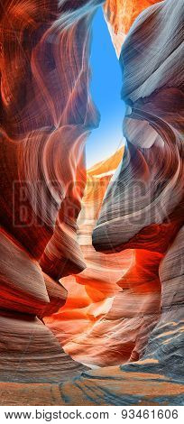 Sunlight reflected off of the red rock curves of the Antelope Canyon Slot Canyons in Page, Arizona.