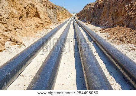 Technological Pipelines Dn50 And Dn 150 Make A Turn By Means Of Bends In The Trench And Approach The