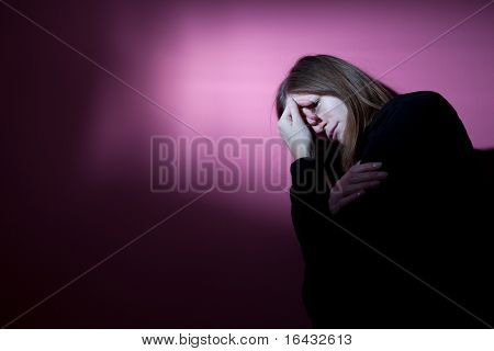 Young woman suffering from severe depression/anxiety