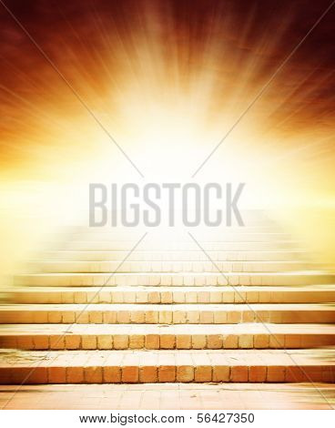 Stairway leading up to bright light