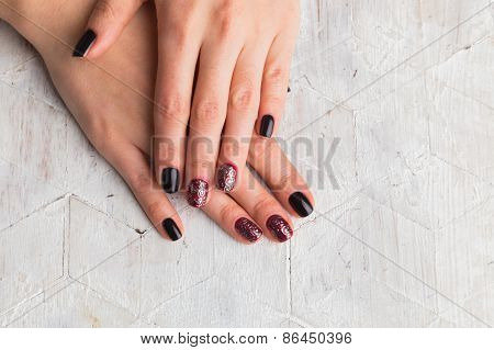 Beautiful female hands with nails painted nails.