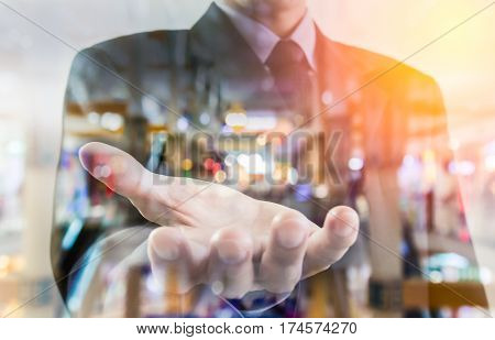 Business Man. Business put his hand forward and business city. Business working and business people concept. Business city background. Business man over sunny office and business people background, business content, business background.