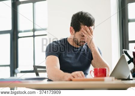 Portrait Of Freelancer Or Office Man Having Headaches, Stressful Of Work, Depressed Or Having A Feve