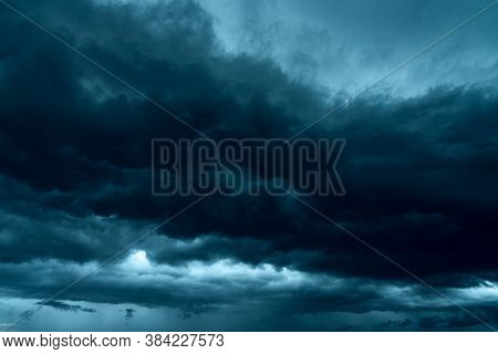 Dark Dramatic Sky And Clouds. Background For Death And Sad Concept. Gray Sky And Fluffy White Clouds