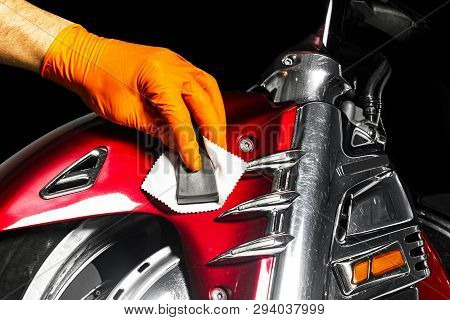 Car Polish Wax Worker Hands Applying Protective Tape Before Polishing. Buffing And Polishing Motorcy