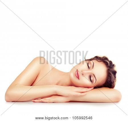 Beauty Woman Relaxing and Lying Down. Spa Girl. Sleeping or Resting Female isolated on White Background. Relax. Relaxation. Beauty Salon