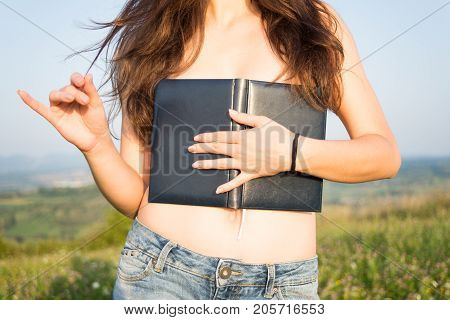 Beautiful Topless Woman Outside With A Book