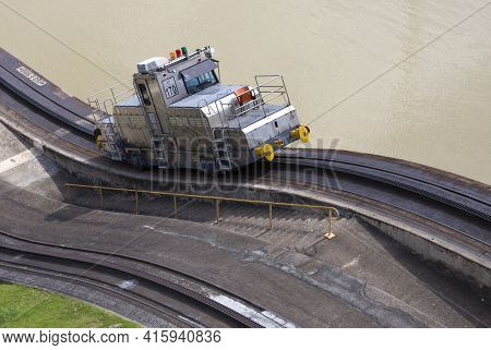 Miraflores Locks, Panama, January 03: Trains (mules) Side Panama Canal. These Mules Are Used For Sid