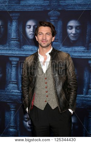 LOS ANGELES - APR 10:  Michiel Huisman at the Game of Thrones Season 6 Premiere Screening at the TCL Chinese Theater IMAX on April 10, 2016 in Los Angeles, CA