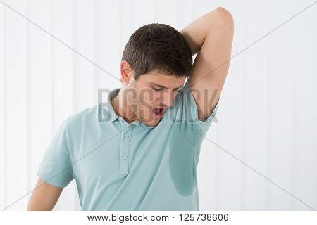 Man Sweating Very Badly Under Armpit