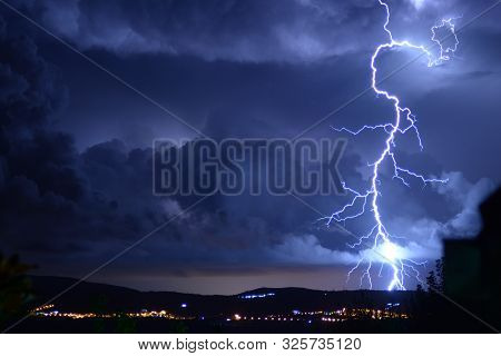 Dangerous Storm Of Lightning And Lightning In The Clouds That Touch The Ground