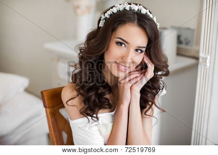 Portrait of the happy bride waiting for a wedding.