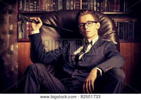 Respectable handsome man in his office. Classic vintage style.