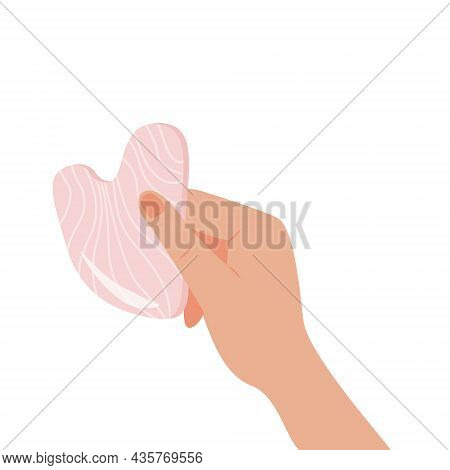 Gua Sha Scraping Massage Tool Holding By Hand. Natural Pink Rose Quartz Stone Scraper. Facial Massag