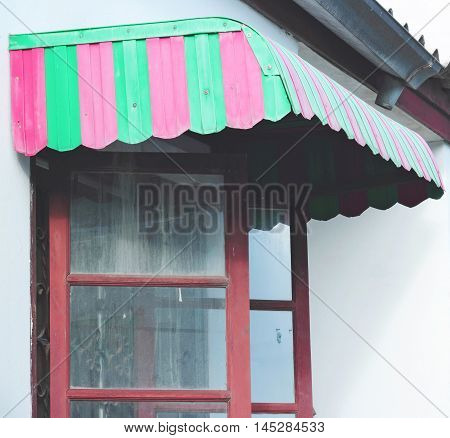 Red And Green Awning Window