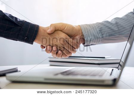 Business Partnership Meeting Concept, Two Confident Business Handshake And Business People After Dis