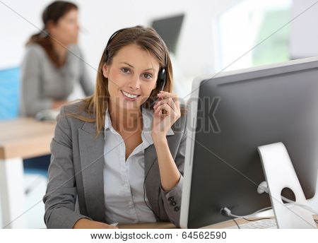 Smiling customer service representative at work