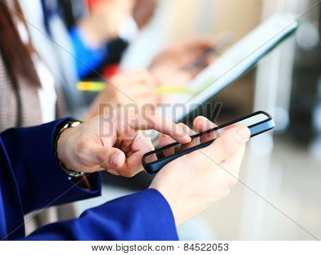 Businessman using modern smartphone or mobile phone. New technologies for success workflow concept