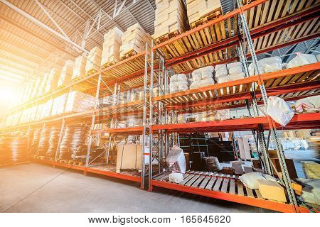 Long Shelves With A Variety Of Boxes And Containers.