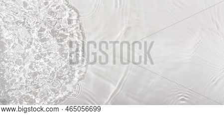 Water Panoramic Banner Background. Water Texture; Water Surface With Rings And Ripple. Spa Concept B