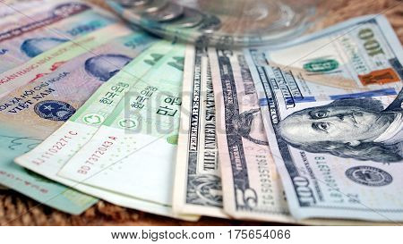 US dollars, Korean Won, Euro bills and some money bills and banknotes. Currency foreign exchange. Business and Financial or money management for investments.