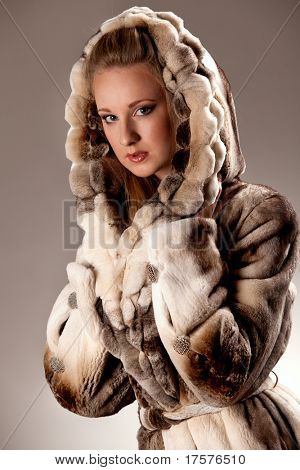 Attractive woman in fur coat