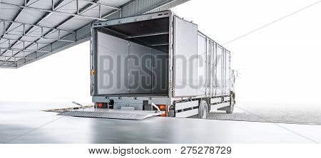 Transport Truck Waiting For Loading Export Merchandise At Industrial Warehouse, Transportation Or Lo