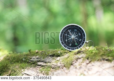 Round Compass On Natural Background As Symbol Of Tourism With Compass, Travel With Compass And Outdo