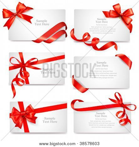 Ensemble de belles cartes avec des arcs de cadeau rouge avec rubans Vector