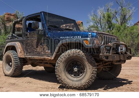 Muddy Jeep in Utah's Canyonlands