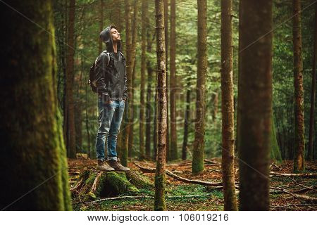 Hooded Man Posing In The Forest