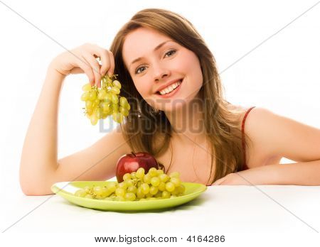 Beautiful Woman With An Apple And Grapes