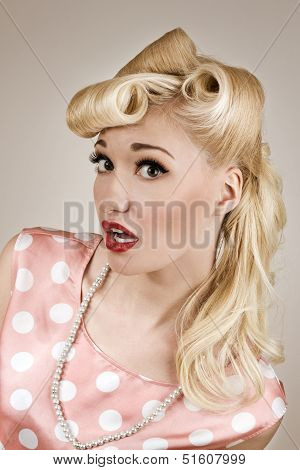 Pin-up Style Portrait Of Surprised Girl