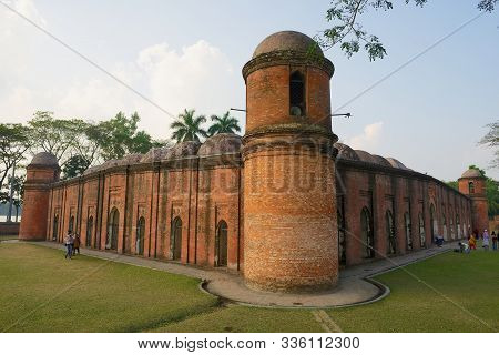 Bagerhat, Bangladesh - February 17, 2014: People Visit Shat Gombuj Mosque In Bagerhat, Bangladesh. S