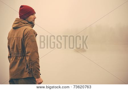 Young Man standing alone outdoor