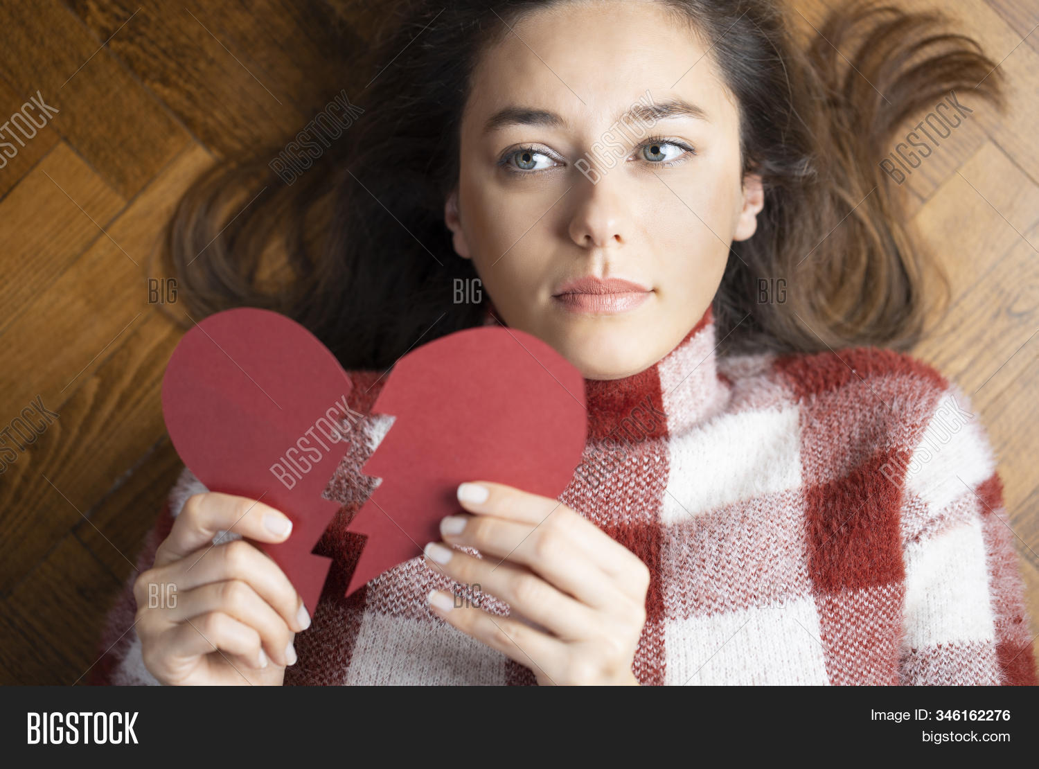 Sad Girl With Heart On Hand