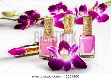 Nail polish, lipstick and flowers