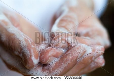 Washing Hands. Rubbing With A Soap. Close-up. Hand Hygiene To Reduce The Spread Of Infections. Handw