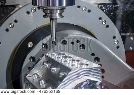 Close Up Scene The 5-axis Machining Center Cutting The V8 Engine Cylinder Block With Solid Ball End 